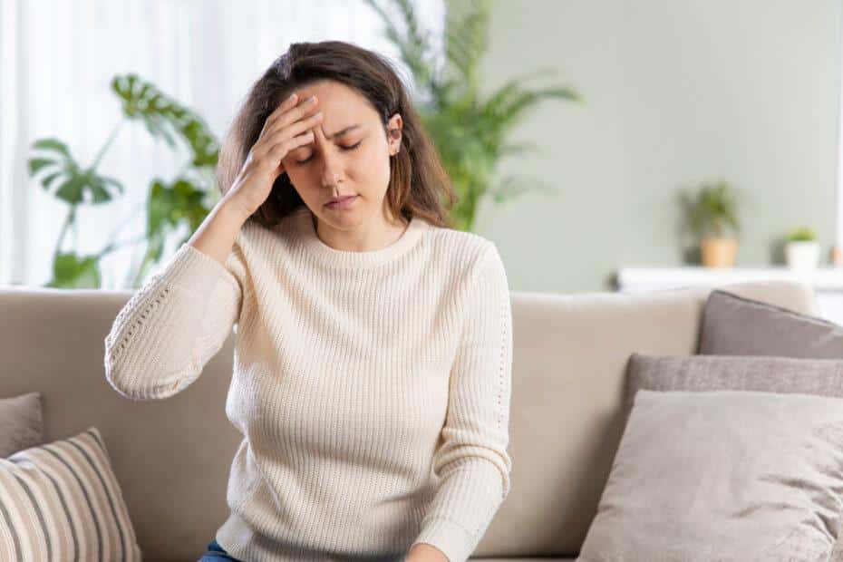 Woman suffering from chronic headaches.