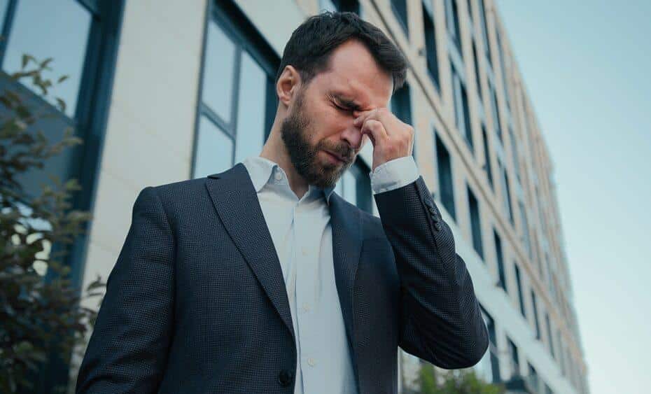 man with migraine.