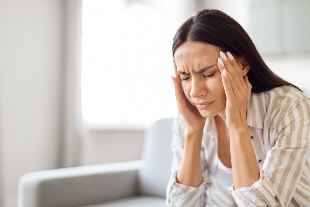 Woman with Migraine